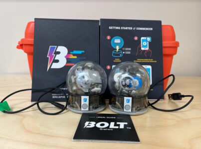 Sphero bolt robots with wires and kit behind it